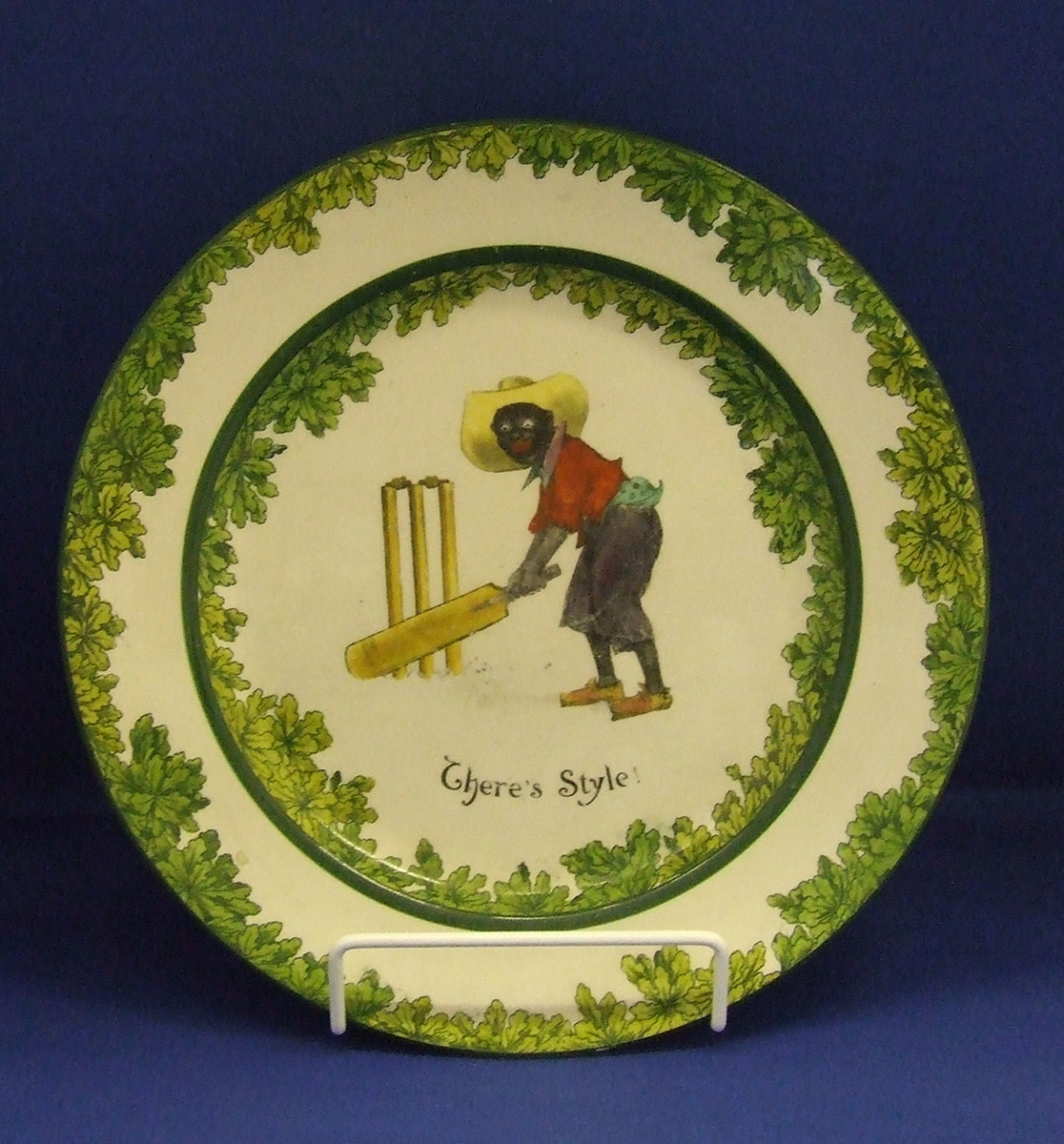 CERAMICS, a Royal Doulton Black Boy plate, 9.5", There`s Style!, printed with a boy in a red