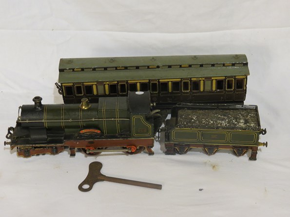 A gauge 2 Bassett Lowke 4-4-0 3410 'Sydney' clockwork loco with tender and carriage, with key