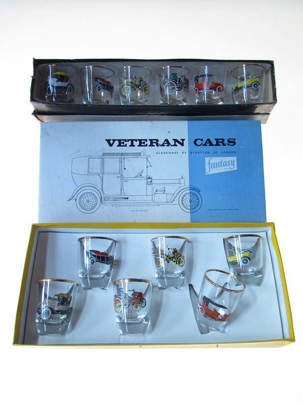 A Stratton of London set of "Veteran Cars" pattern dram glasses and a similar set, in original boxes