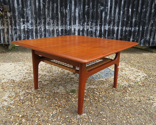 A 1960s Danish teak coffee table with woven undertier, makers Trioh 75cm x 75cm x 42cm
