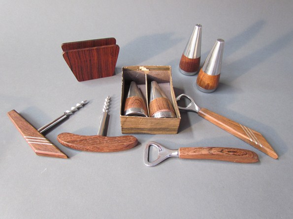 Two wood and steel bottle openers and two corkscrews, two Danish salt and pepper sets and a wooden