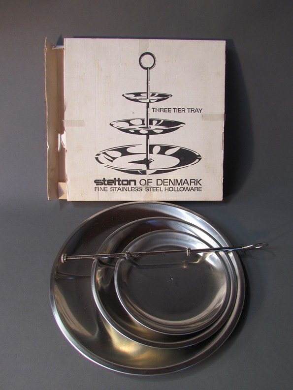A Stelton of Denmark stainless steel cake stand , in original box