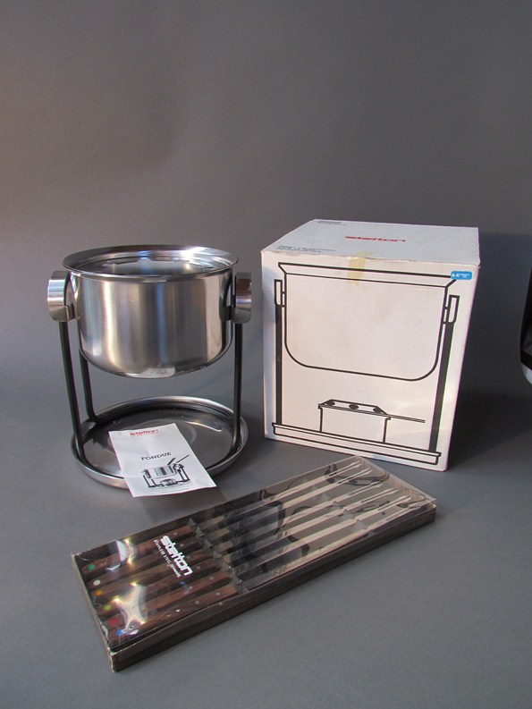 A boxed Stelton of Denmark fondue set and a box of fondue forks