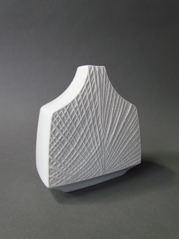 An early 1970s Krautheim geometric form duo glazed and matte white vase with the raised spun fibre