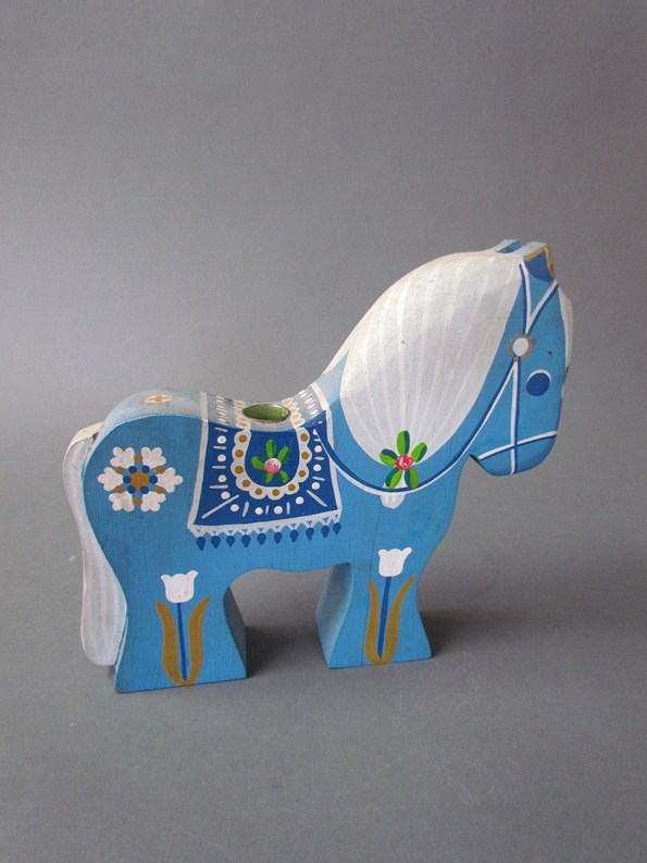 A Danish candle stand in the form of a horse probably by Kay Bojesen