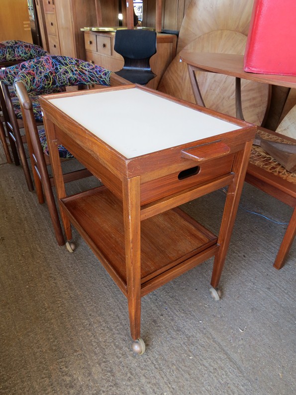 A 1960's teak serving trolley with lift off tray