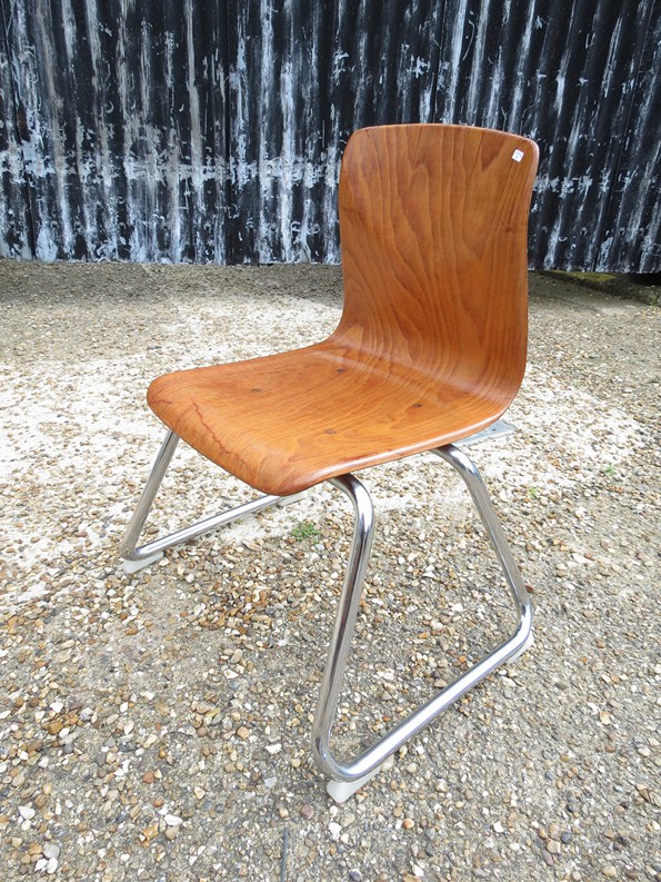 A Flototto childs tubular chrome chair