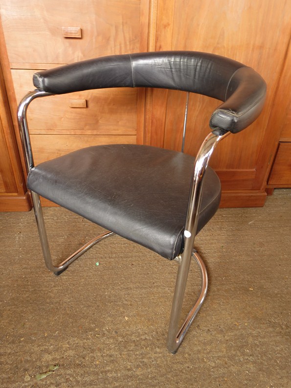 A tubular chrome and leather desk chair in the Pel manner