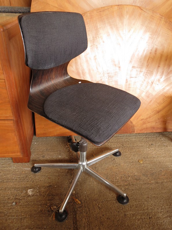 An upholstered Flototto office chair