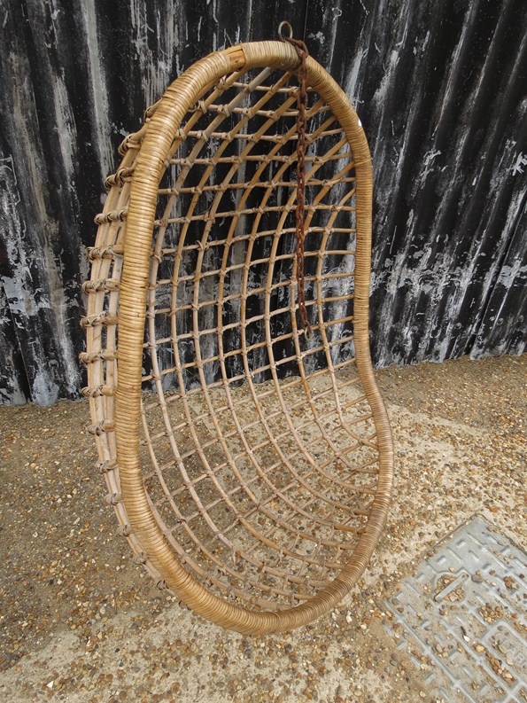 A 1960's hanging cane chair