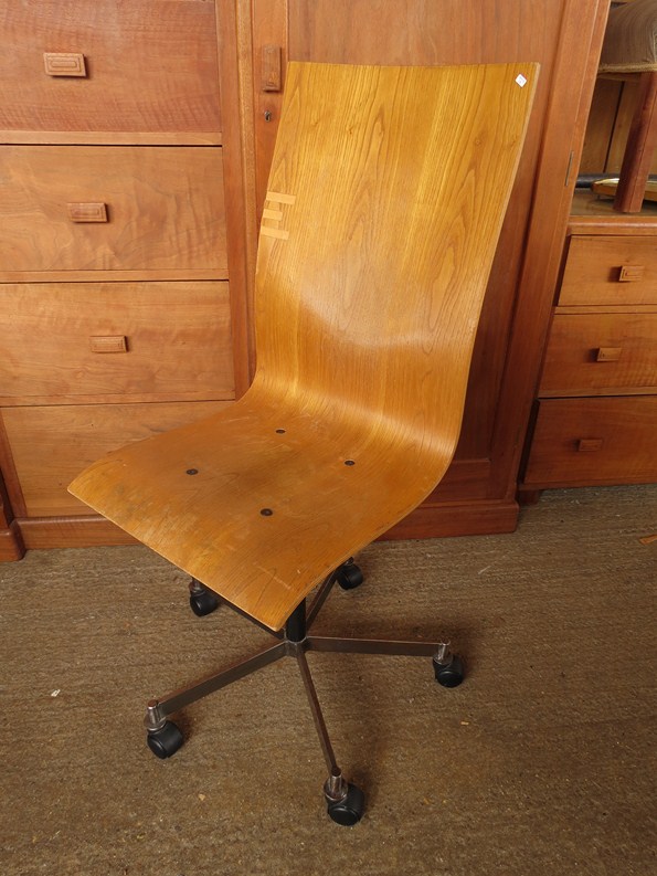 A bent plywood office chair