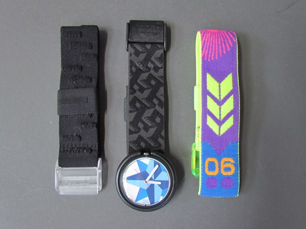 A Swatch watch with two spare straps
