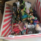 A box of souvenir costume dolls