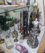 A large quantity of costume jewellery and display stands