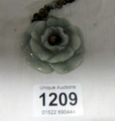 A Jade flower Pendant