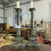 A pair of metal table lamps