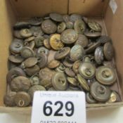 A box of military buttons including Canadian Air Force