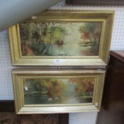 A pair of framed and glazed oils on board, swans on lake, signed J Sheardown, 1907