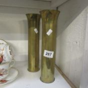 A pair of WW1 brass shell case vases