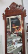 A mahogany framed mirror