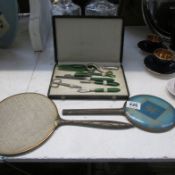 2 hand mirrors and a vanity set