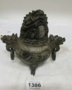 An Oriental 'Dragon' pot with lid