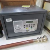 A small combination safe with key