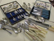 A mixed lot of cutlery including cased set of knives