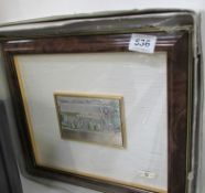 A framed Italian white metal plaque