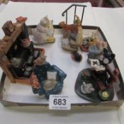 A collection of cats including Beswick Beatrix potter