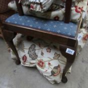 A dressing table stool