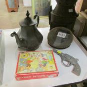 A railway lantern, pewter teapot, toy pistol and puzzle blocks