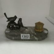 An Art Deco inkwell on marble base surmounted birds