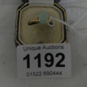 A 14ct gold ring set Jade
