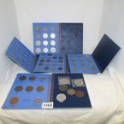 A quantity of GB coins in folders (incomplete) and some pre 1947 loose coins