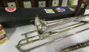 A cased Hawkes Superior Class silver plated trombone