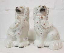 A pair of Staffordshire dogs