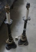 A pair of bronze effect table lamps