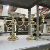 A pair of silver plated candelabra