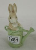 A Beswick Beatrix Potter 'Peter in the watering can'