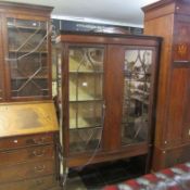 A mahogany astragal glazed cabinet