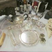 A mixed lot of silver plate including tea set, candelabra etc