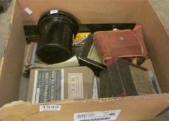 A box of photographic items, films etc