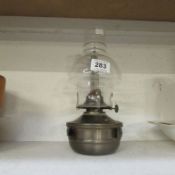 A vintage style barn oil lamp