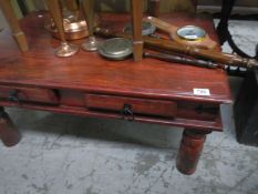 A stained wood coffee table