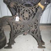 A cast iron table base and bench ends
