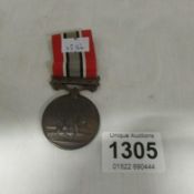 A British Fire Service medal with bar