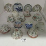 11 Chinese tea bowls and 4 saucers, some a/f