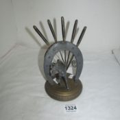 A horse shoe letter opener stand