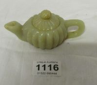 A small jade teapot